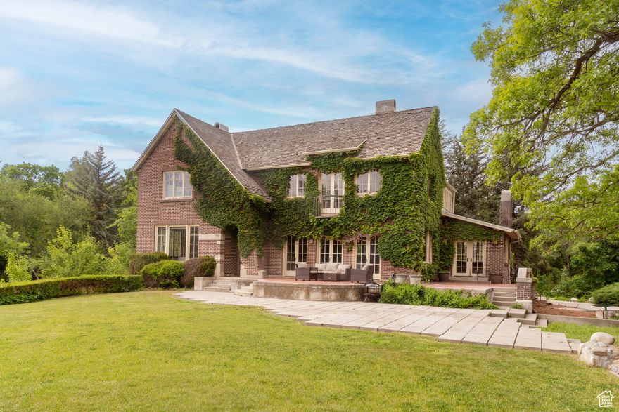 Spectacular and serene two plus acre estate with unmatched views and privacy. Thick woods surround the property. Rolling lawns and open meadows give a country feel. Charming 100 year old English Manor home, in need of major work, presides over the estate from a natural knoll. There are two entry points...one off 6200 South and one to the north off Old Orchard. Walking paths wind around to sitting areas, a vegetable garden, and extensive stone walls and pillars of great character. A winding gravel lane connects both entries. This is the ultimate opportunity for a wonderful home site in the very best Holladay location. Instant access to everything.