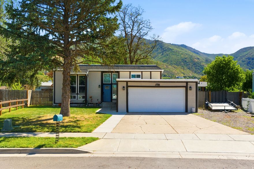 *OPEN HOUSE | SATURDAY 5/23 | 12:00PM - 2:00PM* Beautifully updated home in a quiet South Ogden neighborhood with stunning mountain views and a fully fenced backyard! This home has been extremely well-maintained, and features a spacious layout with abundant natural light, updated kitchen cabinets, new granite countertops, and a gorgeous custom blue fireplace that truly makes the living space stand out. Enjoy the covered deck, mature trees, and spacious backyard perfect for relaxing or entertaining. Major updates include New Windows and Roof in 2023, New LVP Flooring throughout, New Water Heater and Water Softener installed in 2023, and recently cleaned & sanitized ductwork throughout the entire home. The AC has also been well maintained and is serviced regularly. All appliances are included with the sale! Conveniently located near parks, schools, shopping, dining, and commuter access. Pride of ownership really shows throughout this home. Buyer is advised to obtain an independent measurement. Call to schedule your showing today! Please text agent if you will be late to your showing time window or unable to make it. Please delay visiting this home if you or one of your clients are experiencing any illnesses or flu-like symptoms. Please include a pre-approval letter or proof of funds with all offers.