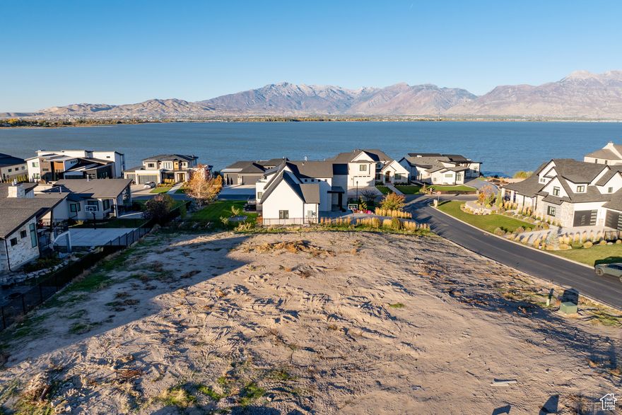 Endless Possibilities in Wiltshire Estates! Discover this .40-acre homesite, ideally located near Utah Lake with stunning mountain views. Nestled in a peaceful neighborhood of quality custom homes, this lot includes access to community amenities such as a clubhouse and walking paths. With utilities already stubbed, it's ready for your next exceptional build in one of Saratoga Springs' most desirable settings. Square footage figures are provided as a courtesy estimate only and were obtained from County Records. Buyer is advised to obtain an independent measurement.