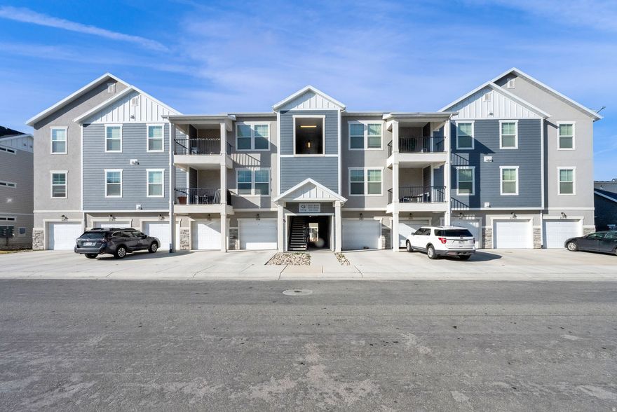 Step into this sleek, main-floor condo located in one of Utah's fastest-growing communities. Built just a few years ago, this home offers the perfect blend of modern finishes and effortless accessibility. Forget hauling groceries up stairs-the attached garage leads you right into a bright, open floor plan.  Location is everything here. You are situated directly adjacent to the clubhouse and pool, making it feel like you have a private resort right outside your front door. Whether you're looking for a primary residence or a solid addition to your portfolio, this unit delivers.  Please Note: This is a short sale. All offers are subject to lender approval. Our team is committed to a quick, transparent, and efficient short-sale process to get you to the closing table.