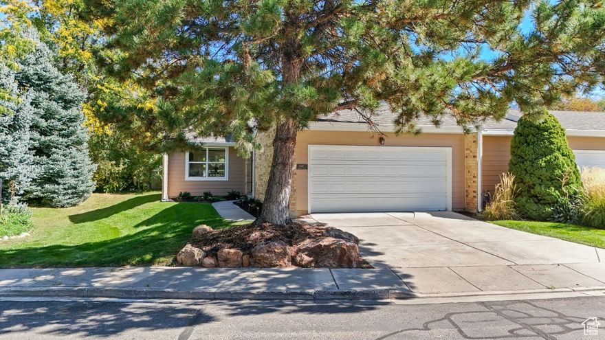 This attached duplex has a two-car garage and patio yard. Primary suite, second bedroom, 3/4 bath, laundry, living space, kitchen, and laundry all on one level. New siding this year, plus new furnace and AC (with heat pump) within the past 18 months. HOA covers snow removal, water, sewer, trash, cable, WiFi, and yardwork for the common area. Excellent location - close to the 215 and Fort Union shopping area.