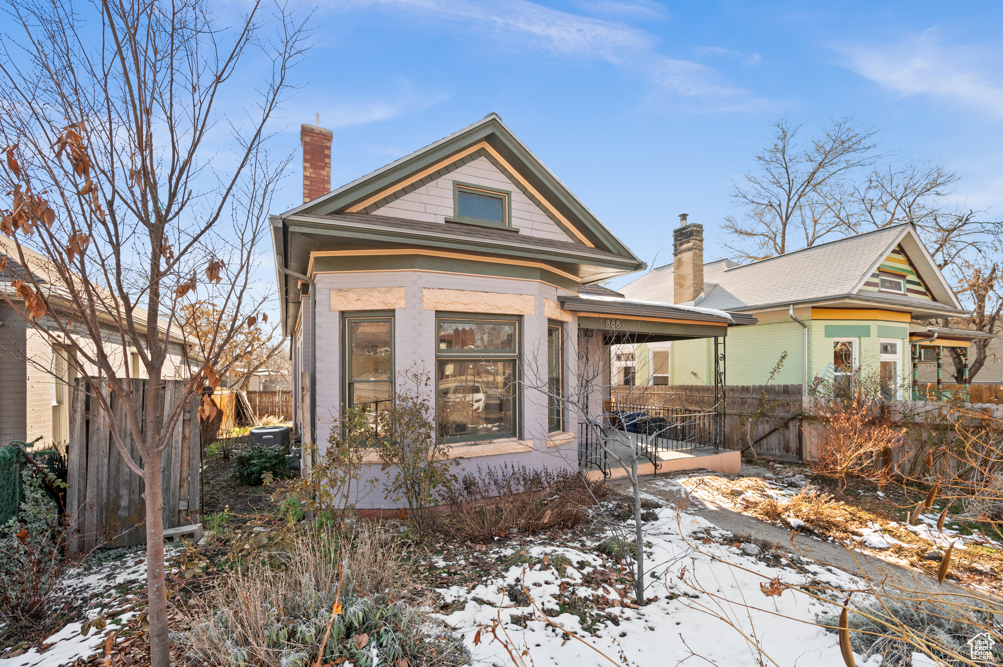 Discover this enchanting 1906 Victorian bungalow where timeless architectural charm meets limitless potential. This 2-bedroom, 2-bathroom home features tall ceilings, a stunning ornate fireplace, gorgeous Douglas fir floors, a bonus office/flex space for added versatility, and much more. Located in the heart of Salt Lake City, you're just steps from Trolley Square, Whole Foods, Trader Joe's, and Trax. Walk to the University of Utah, explore downtown, or enjoy the vibrant shops and eateries of the 9th and 9th district. Major updates include a new 45-year roof and gutters (2016), furnace (2016), tankless water heater (2018), fresh paint (2019),  A/C unit (2021), and an updated service panel (2022), up-to-date plumbing and new electrical system with with wired fire alarms (battery backup) to boot! With a solid foundation of improvements, this home is ready for your finishing touches. With an unfinished basement offering additional possibilities, this gem blends history, modern convenience, and an unbeatable location at an incredible value. Don't miss this opportunity to create your dream home!    Square footage figures are provided as a courtesy estimate only. Buyer is advised to obtain an independent measurement.