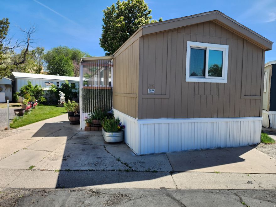 This 2 bed 2 bath larger than normal single wide is set to impress! This charming home features a recently installed split A/C System. Side by side parking! The best looking yard in the community! Be ready for the pool this summer! The community pool is just 2 doors down along with the visitor parking! Schedule your tour today! We have many financing options for this type of property. Sq. Ft. provided as a courtesy measurement only. Buyer/Buyer Broker to verify all information.