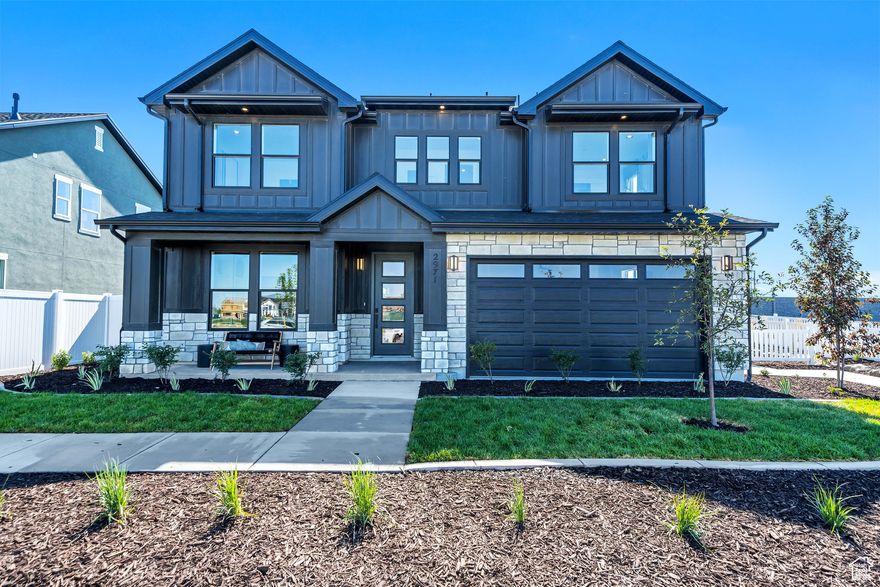 Incredible Brighton Plan Model Home! This exquisite home features a state-of-the-art chef's kitchen complete with quartz countertops. Enjoy natural light through a grand 10' sliding glass door that seamlessly merges indoor and outdoor spaces, and entertain or unwind on the covered patio that's just on the other side! Cozy up by the fireplace that makes a statement. Experience unparalleled comfort and design with every detail thoughtfully imagined for modern living. Furniture to be sold on separate bill of sale for $10,000.