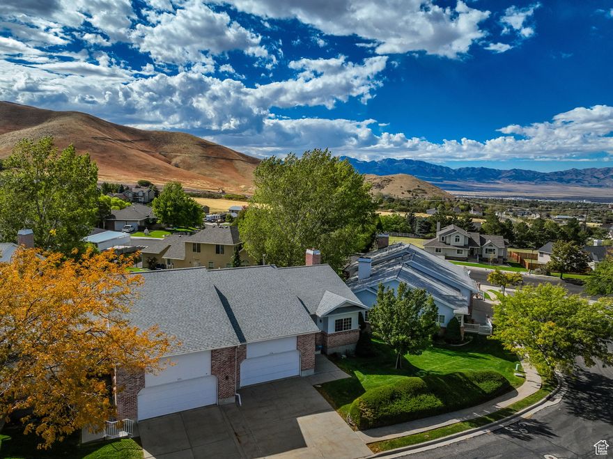 Welcome to this well-maintained condo nestled in one of Tooele's most sought-after neighborhoods! This location makes stunning mountain views and wildlife visits a daily occurrence. Enjoy peaceful, quiet living just minutes from local shopping, dining and outdoor recreation! Pride of ownership shows throughout this clean and cozy 3 bedroom, 2 bathroom unit. This condo has a spacious master suite, 2 car garage, new flooring, central vacuum, private deck, community pool and plenty of room for customization in the partially finished basement! Don't miss this rare opportunity to own a charming unit in a prime location, offering fresh air above Utah's seasonal inversion! Square footage figures are provided as a courtesy estimate only and were obtained from county records. Buyer is advised to obtain an independent measurement.