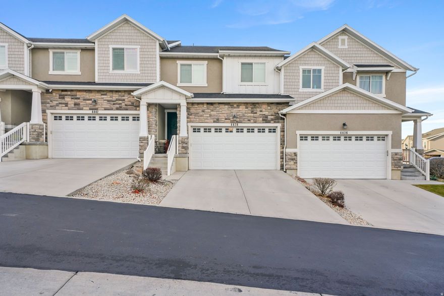 Bright, Spacious, and Perfectly Located!     Step into this stunning Herriman townhouse featuring vaulted ceilings, expansive windows, and abundant natural light that make every room feel open and inviting. With over 2,300 sq. ft. of living space, there's plenty of room to grow with your family. Enjoy a modern kitchen with granite countertops, a private master suite oasis, and a fully landscaped patio for relaxing evenings. Nestled near exclusive restaurants and highend shopping, this home offers both convenience and luxury. HOA amenities include a clubhouse, gym, playground, and pool-everything you need for an elevated lifestyle.