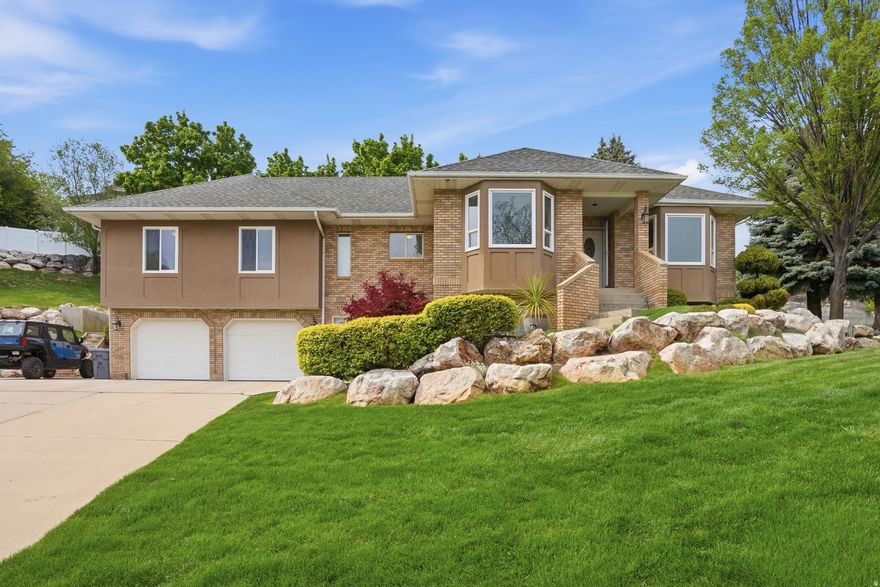 Tucked away at the end of a quiet cul-de-sac in one of South Ogden's most secluded neighborhoods, this stunning brick home is a rare find. Built and lovingly cared for by a custom home builder, every detail of this single-owner property reflects the kind of pride of ownership you simply can't manufacture. Sitting on a generous half-acre lot framed by mature trees, this 3,500 square foot home offers 5 bedrooms and 3 bathrooms across a thoughtful layout built for both comfort and functionality. The main level hosts 3 spacious bedrooms including a large primary bedroom and 2 full bathrooms. Take the stairs or the firepole (!!!) down to the finished basement where there is large entertaining space, an additional bedroom, ample storage, and full bathroom plus an office, perfect for remote work, a hobby room, or whatever your lifestyle demands. Step outside and you'll immediately understand what makes this property special. The large covered patio is an ideal setting for entertaining or relaxing in the shade of the mature trees that surround the backyard. And when it comes to storage, you're covered there too with a large storage shed tucked right in the back. With the craftsmanship of a custom builder baked into every corner and a location that offers true privacy without sacrificing convenience, this one is hard to beat. Properties like this don't come along often, so don't sleep on it. Call today for a private showing!