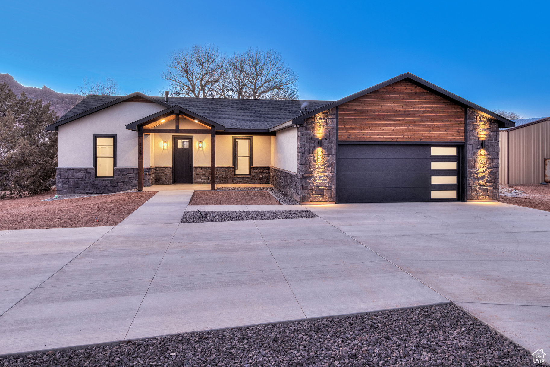 Brand-New Moab Home with Red Rock Views and Custom Touches. Welcome to your dream home in the peaceful Watchman Estates neighborhood, just moments from Moab Golf Course. This brand-new three-bedroom, 2 1/2-bathroom home combines modern comfort with a serene setting. The primary suite offers a spacious retreat with a double vanity, a walk-in closet, and a luxurious bath featuring a separate tub and shower stall. The open-concept kitchen boasts stunning alder cabinets, adding dramatic flair to your space, while the cozy gas fireplace in the living area is perfect for relaxing evenings. Step outside to a private backyard oasis with a covered patio, mature trees, and breathtaking red rock views. With minimal landscaping, you'll have the opportunity to make this outdoor space uniquely yours. A two-car garage rounds out this exceptional property.  Taxes are based on the land only.  Taxes are to be determined with the home included. Discover the perfect blend of comfort, style, and natural beauty.