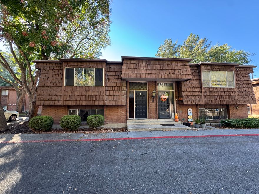 Welcome to your cozy sanctuary! Tucked away in a peaceful community blanketed by lush, mature trees, this inviting end-unit townhouse is ready for its next owner. The comfortable 2-bedroom, 1.5-bathroom floor plan is illuminated by abundant natural light. You'll appreciate that the major work is already done: this home has been meticulously maintained with updated flooring, newer kitchen appliances, fresh carpet and paint, a new water heater (2024), and a reliable furnace less than five years old. With the washer, dryer, and refrigerator included, your move is truly effortless.  Community amenities offer a fenced pet play space and a communal area complete with picnic tables and BBQs. Enjoy the best of both worlds: quick access to the local hotspots of Millcreek Commons and Sugar House plus convenient freeway access, all while maintaining a quiet neighborhood setting.  Square footage figures are provided as a courtesy estimate only and were obtained from county records. Buyer is advised to obtain an independent measurement.