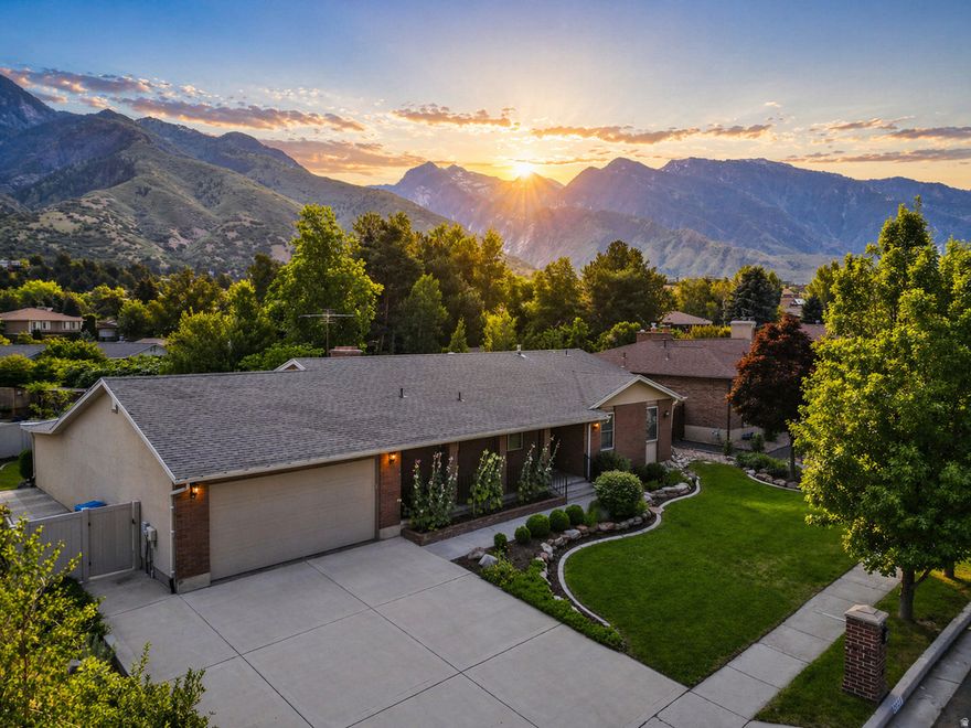 Nestled in the heart of Cottonwood Heights between Big and Little Cottonwood Canyons, this stunning rambler offers the perfect blend of comfort, location, and breathtaking scenery. Surrounded by some of Utah's most iconic mountain landscapes, you'll enjoy unobstructed views that change beautifully with every season.  This thoughtfully designed single-level home features an open, inviting layout filled with natural light, making it ideal for both everyday living and entertaining. Large windows frame the incredible mountain views, bringing the outdoors in and creating a true sense of serenity.  Step outside and you're just minutes from world-class skiing, hiking, and year-round recreation, while still enjoying the convenience of nearby shopping, dining, and top-rated schools. Whether you're relaxing on the patio, hosting friends, or heading up the canyon for an adventure, this home delivers the lifestyle you've been looking for.  A rare opportunity to own a rambler in one of the most sought-after locations along the Wasatch Front-where mountain living meets everyday convenience.