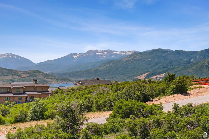 Discover the enchanting community of Golden Eagle, just 10 minutes outside Park City, Utah-a gateway to unparalleled outdoor adventures. This premier homesite offers panoramic mountain, lake, and ski resort views, making it the epitome of luxury living. With a pre-cut driveway, this easily buildable lot sets the stage for your dream home. Embrace four-season escapades right from your doorstep, with three world-class ski resorts-Park City Mountain, Deer Valley, and the upcoming Mayflower Mountain Resort (opening in 2024-25)-mere minutes away. In the summer, indulge in the thrill of water activities at four mountain reservoirs within 30 minutes, or take a quick 10-minute drive to the Jordanelle. Fishing enthusiasts will find paradise in the nearby Provo and Weber rivers, known for some of the best fly fishing in the West. For golf enthusiasts, there are 13 courses designed by some of the game's best architects within easy reach. Hiking, biking, horseback riding, and snowmobiling are conveniently accessible through nearby trails. Only a short 14-minute drive away lies Historic Park City, the vibrant heart of our mountain town. Nestled between Park City Mountain Resort and Deer Valley, this gem has a rich history, evolving from a silver town to a world-class destination. Explore the town's adventurous spirit, fueled by a past marked by booms, busts, and historic events like the 2002 Winter Olympics and the Sundance Film Festival. Discover the magic of Golden Eagle and live where adventure meets luxury.