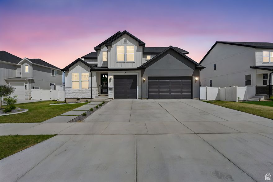 Welcome to your new home! This practically new home has been thoughtfully renovated and custom designed leaving no stone unturned! Enjoy the beautiful lake views from your massive windows and custom built back deck. Head downstairs to find a stunning custom kitchenette with imported black marble. Want to relax? A movie room is awaiting to enjoy with guests. Make your way upstairs and notice the white oak steps with a designer runner. As you enter the massive master bedroom you are greeted with more stunning views of the mountains and lake as well as a thoughtfully designed master bathroom with custom cabinetry, tile, and a soaking tub. Each bedroom upstairs has its own connected bathroom for convenience and walk-in closet. The bedroom on the main floor is currently being used as an office. Pickleball, basketball or golf fan? You're in luck with this versatile backyard offering, a pickleball/basketball court, putting green, fireplace, inground trampoline and plenty of green space to enjoy! Want to enjoy sports at night? Enjoy the built in sports light and outdoor speakers! This home is sure to check all the boxes for any homeowner! Schedule a showing and be in awe of this beautiful custom home!  Square footage figures are provided as a courtesy estimate only and were obtained from builder.  Buyer is advised to obtain an independent measurement. *Up to $10,000 in sellers concessions.