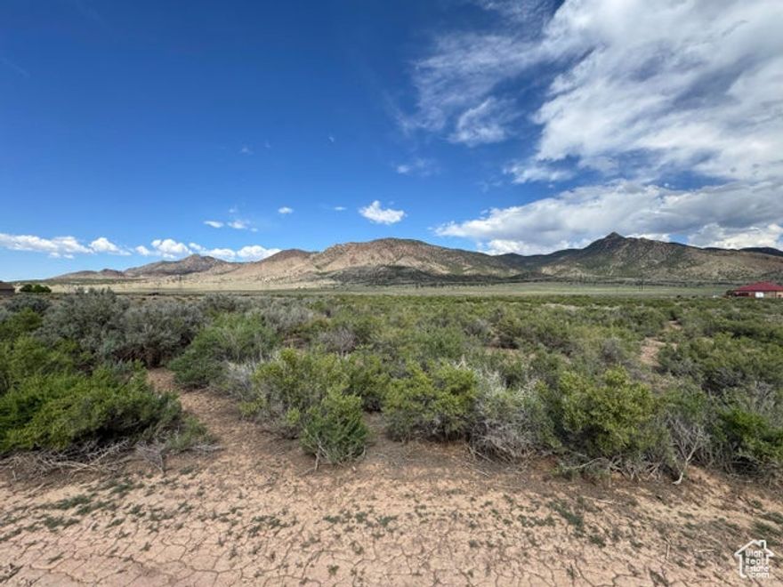 Now Available / Now Showing. Newcastle, Utah. Broken Spur subdivision. 5.05 Acre residential lot with 0.45 acre foot of water right #71-1562 (priority date of 5/17/1943). This is a good water right and the right amount to drill a well. This lot is located with amazingly beautiful mountain views to the East and views of the entire valley and surrounding mountains. Don't be surprised to see deer or antelope. Come build a home, cabin, or use this for a family vacation retreat property. Bring your RV, camper, UTV, ATV, side by side and explore the mountains. Newcastle Reservoir is only 17 minutes away for boating/fishing. Only 20 minutes to Enterprise for gas, groceries, schools, hardware, restaurants, etc. Only 2h45min to Las Vegas, Only 42min to Cedar City and only 1 hour to St. George.