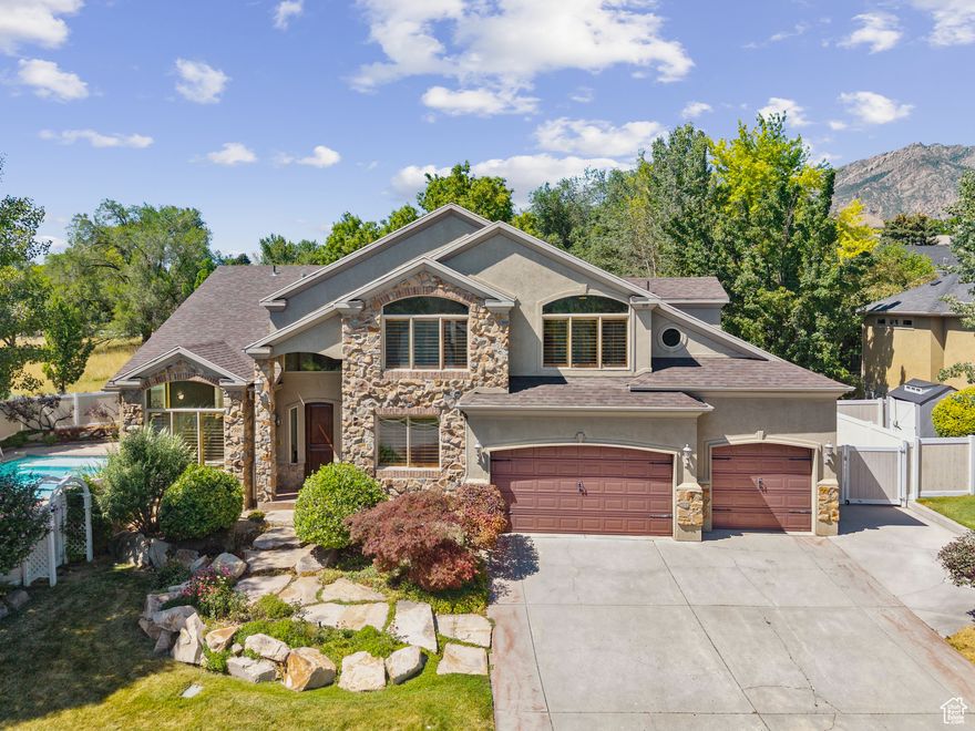 Location, Location, Location! Welcome to this well-appointed home located on one of the best streets in Cottonwood Heights. Located in Danish Cove with stunning mountain views, this property offers an ideal balance of comfort, space, and convenience. Inside, you'll find a versatile layout with multiple living and gathering spaces that make daily living and entertaining a breeze. Generously sized rooms and large windows bring in plenty of natural light, while the functional floor plan provides the perfect amount of space. The expansive basement has a separate entrance that features space for a home theatre and an additional kitchenette or bar. Exercise in the basement workout room or use it as a 7th bedroom, the possibilities are endless. The backyard features a private pool and mature landscaping, offering a great space to relax or entertain outdoors during the warm summer months. Situated just minutes from dining, shopping, and outdoor recreation, this home delivers on both location and lifestyle. Quick access to I-215 makes commuting or weekend adventures effortless. As a bonus, the home has recently received key improvements including a new roof, new flooring, steam shower, and fresh interior paint. Don't miss your opportunity to own this standout home located in the heart of Cottonwood Heights. Square footage figures are provided as a courtesy estimate only and were obtained from county records. Buyer is advised to obtain an independent measurement.