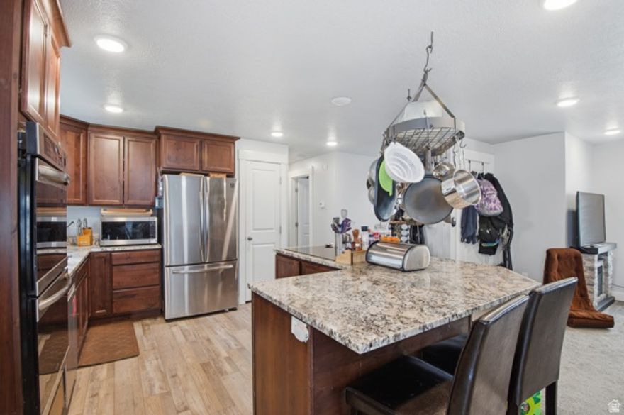 Welcome to this beautifully updated 5-bedroom, 1.75-bath single-family home in the desirable Garland neighborhood. Offering 2,052 square feet of spacious living, this move-in ready home provides the perfect blend of comfort, style, and functionality for modern living.   Major upgrades completed in 2021 include a new roof, updated electrical panel, central air conditioning, stylish flooring, upgraded cabinets, and modern appliances-giving you peace of mind and long-term value. The open and inviting layout is ideal for both entertaining guests and everyday living, with ample space for families of all sizes.  Nestled in a quiet, established neighborhood, this Garland home combines convenience with tranquility. Whether you're relaxing at home or hosting gatherings, you'll appreciate the thoughtful updates and versatile living spaces throughout.  Don't miss this incredible opportunity to own a fully updated home in Garland-schedule your showing today!