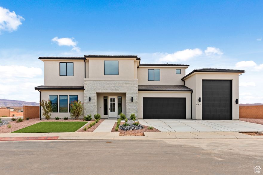 Just finished! 5 bedrooms, 4.5 bathrooms, corner lot, RV garage + additional RV parking space, primary suite with a gorgeous bathroom with double vanity, walk-in tiled shower, soaker tub and walk-in closet, additional ensuite on the main level, grandiose entryway with a beautiful staircase, large open great room, dining and kitchen with lots of windows looking out to the nice sized backyard that has an empty canvas, block walls on 3 sides, quartz countertops, custom cabinets, stainless appliances including the refrigerator, tankless water heater, rain gutters, large loft that leads to a spacious covered balcony with great views, builder warranty and Dixie Power District. All information is deemed reliable but not guaranteed, buyer to verify all.