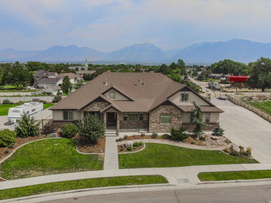 LOCATION, LOCATION! This Custom South Jordan Rambler sits at the end of a quiet street that gives you a secluded feel as there are no neighbors on 2 sides of the property. 180 degree Views from this west facing home that offers shade in the evening from the covered back patio overlooking the pool and the entire valley. Inviting Entry w/Grand Staircase to the Huge loft that sports a bed & bath & kitchenette, laundry & it's own family room and sitting covered deck w/spiral staircase to the back yard . The main floor living has a Great Room the Master Suite w/HUGE WIC that accesses the laundry. off the entry are a Den and Formal Living & Dining Rooms. The basement has 2 Large bedrooms a massive rec room w/kitchen and a theater room under the covered back patio w/ game or exercise room and a big cold storage & laundry. The home has many smart features you can control from your phone. Text Adam for your showing time.