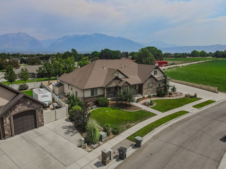 LOCATION, LOCATION! This Custom South Jordan Rambler sits at the end of a quiet street that gives you a secluded feel as there are no neighbors on 2 sides of the property. 180 degree Views from this west facing home that offers shade in the evening from the covered back patio overlooking the pool and the entire valley. Inviting Entry w/Grand Staircase to the Huge loft that sports a bed & bath & kitchenette, laundry & it's own family room and sitting covered deck w/spiral staircase to the back yard . The main floor living has a Great Room the Master Suite w/HUGE WIC that accesses the laundry. off the entry are a Den and Formal Living & Dining Rooms. The basement has 2 Large bedrooms a massive rec room w/kitchen and a theater room under the covered back patio w/ game or exercise room and a big cold storage & laundry. The home has many smart features you can control from your phone. Text Adam for your showing time.