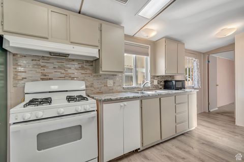 Photo of 748 W MONTE BLANCO S, Taylorsville, UT 84123 (MLS # 2116697)