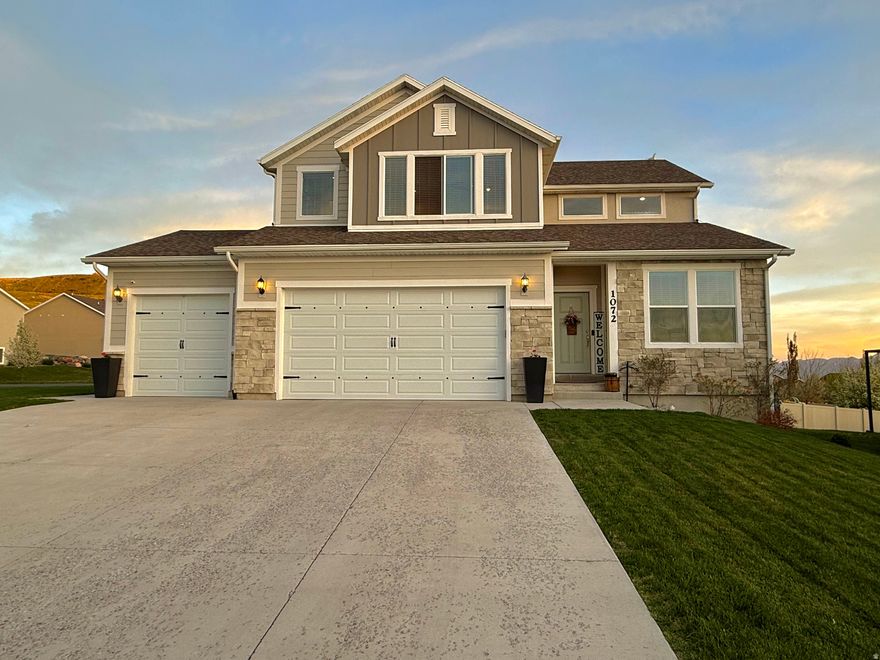 Beautiful two story home with high-end finishes. Solid walnut soft-touch cabinets, quartz countertops and modern Smart technology. Located in highly sought after east bench neighborhood with incredible mountain and valley views. Conveniently located to shopping, restaurants and many popular attractions. Home has been meticulously cared for. Features open and spacious living areas, large bedrooms, gorgeous feature walls, custom closets w/ built ins, walk-in pantry, new carpet throughout. You'll love the flex space off of garage with separate entrance and sink. Could be used for salon, gym, or office. Beautiful landscaping that has been well-maintained and includes a custom patio with fire pit. If interested, home is available "turn key". This could include all furnishings, appliances, decor, lamps, dishes, linens, everything, if desired.