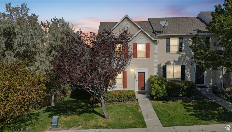 We all have our wish list for the perfect home-move-in ready, lovingly maintained, in a peaceful neighborhood yet close to every convenience. Welcome to 337 E Braidhill Drive, a charming end-row townhome in an established, tree-lined Draper community that checks every box. Perfectly situated to capture both mountain and valley views, you can enjoy breathtaking sunsets and the beauty of Utah Valley from the expansive deck, now updated with fresh paint and new blinds for a welcoming feel.  Inside, you'll find a bright, open layout filled with natural morning light and a cozy fireplace for evenings at home. The spacious dining area flows seamlessly to the deck-ideal for grilling, hosting friends, or simply relaxing with a view. Recent updates include a brand-new water heater and stove, adding comfort and peace of mind for the new owners.  Upstairs, you'll discover a sizable south-facing bedroom, a full guest bath, and a private primary suite with its own ensuite bathroom. Some neighbors have even converted the main floor closet into a convenient half bath thanks to easy access to plumbing-an option that could easily be done here to add extra functionality.  The walkout lower level is a true bonus, featuring a massive den (easily convertible into a third bedroom), another guest bathroom, and a dedicated laundry room. Enjoy peaceful evenings from the lower patio and take in the fresh air. All appliances are included for a quick and easy move-in, and two parking spaces right out front add convenience. With a low HOA, minimal maintenance, and proximity to all Draper amenities, this home is equally perfect for owner-occupants or as an investment property.