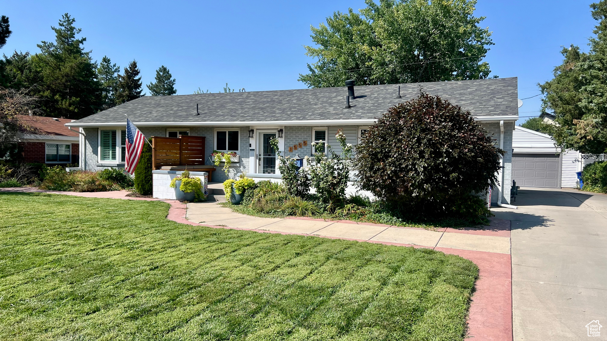 Experience one-level living in Holladay's highly sought-after Cottonwood Club neighborhood. Situated on a quiet street, this turn-key rambler offers seamless indoor-outdoor living. Inside, the open floor plan impresses with original hardwood floors and fully renovated spaces. The thoughtfully designed kitchen showcases rich wood cabinets, a breakfast bar, extensive quartz countertops, and stainless-steel appliances. Renovated bathrooms feature ceramic tile floors, chrome fixtures, new vanities, a relaxing bathtub, and a walk-in shower with European glass. Step outside, where the best may truly be yet to come. Enjoy spectacular views of the Wasatch Range from the front porch or retreat to the backyard. Here, an enormous covered patio overlooks the private and meticulously landscaped backyard and is equipped with ceiling fans and retractable sunshades for all-season comfort. A significant bonus is the oversized two-car garage structure (952 sq. ft.), which includes a finished studio. Complete with heating, cooling, and a closet, this versatile studio area is perfect for a private guest room, home office or fitness space. This oasis is located moments from top schools, local shops, restaurants, highway access, and world-renowned canyon recreation. Verification: Buyer is responsible for verifying all listing information, including square feet and acreage, to buyer's own satisfaction. All information herein is deemed reliable but is not guaranteed.