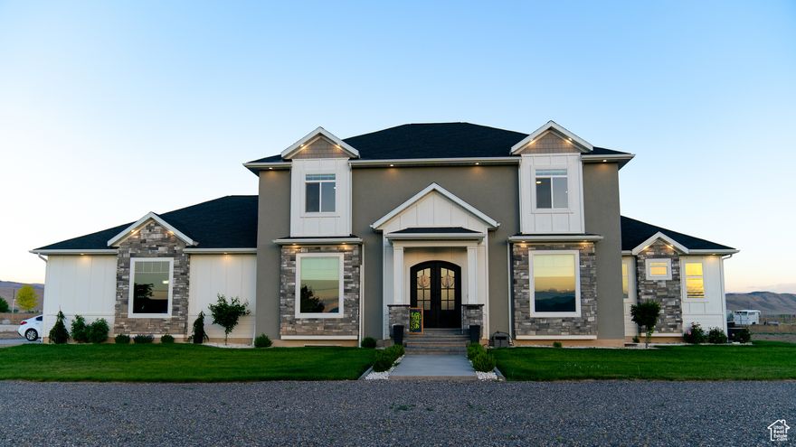 New Improved Price!!! Welcome to your dream home in beautiful Axtel, Utah. This stunning newer construction offers a perfect blend of luxury and comfort, sitting on a sprawling acre+ of land. With 6 spacious bedrooms and 5 modern bathrooms, there is plenty of room for everyone. Step inside to find a thoughtfully designed floor plan.The gourmet kitchen is a chef's delight, featuring top-of-the-line appliances, ample counter space, and a large island with a built in ice maker, walk-in pantry with a grocery door. the open- concept living and dining areas are ideal for both casual family time and hosting gatherings. Downstairs, keep an active lifestyle with the home gym, and enjoy family movie night in the home theater room. Outside, the expansive yard provides endless possibilities for outdoor activities, gardening, or simply enjoying the serene surroundings. This home is truly a sanctuary, offering luxury living in a peaceful setting. Don't miss out on the opportunity to make this exceptional property your own!