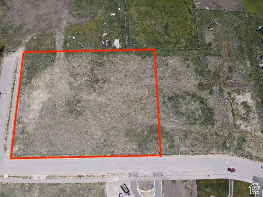 This premium location offers unobstructed 360 views of the surrounding mountain ranges, creating a stunning natural backdrop in every direction. The lot is fully improved with gas, water, electricity, irrigation, sewer, and cable. The corner placement offers added flexibility for design and access.