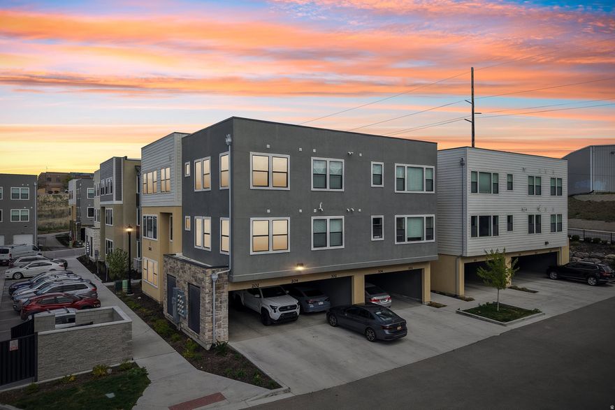 This middle-unit condo features brand new hard flooring throughout the living areas and both secondary bedrooms. Most rooms have been professionally painted and are move-in ready. Located just one mile from Midvale Main Street, it's an easy walk to shops, restaurants, and local amenities. Walking trails from the community connect directly to the 45-mile paved Jordan River Parkway Trail, and the refreshed lake area is perfect for outdoor enjoyment, walks, or biking. The owners are relocating but truly love this area and hate to leave. It comes with two assigned parking spots (tandem/back-to-back in the garage). We're also offering 1% of the purchase price toward closing costs or to buy down the rate if you use our preferred lender.