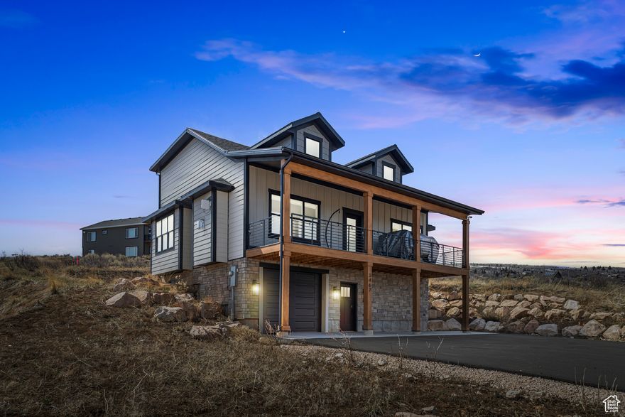 Discover this stunning 3 bedroom, 3.5 bath mountain modern home in the heart of Garden City's Sweetwater Golf Course subdivision. Fully furnished and turn-key, this property is ready for immediate use as a short-term rental or your personal Bear Lake retreat. The open-concept great room flows seamlessly into the gourmet kitchen and dining area, perfect for entertaining. Upgrades include a tankless water heater, high-efficiency HVAC, quartz countertops, and luxury vinyl flooring. Enjoy year-round access, just steps from the Bear Lake golf course and minutes from Hodges Canyon for ATV and snowmobiling adventures. Optional Ideal Beach Pass available for $1,900/year, granting access to private beaches, pools, pickleball courts, and more (visit https://bearlake.org/cat/entertainment for details). Only a short drive to the marina and local amenities. Square footage and measurements are provided as a courtesy from architectural drawings; buyer and buyer's agent to verify.  LOT 30 OMEGA SUB 5