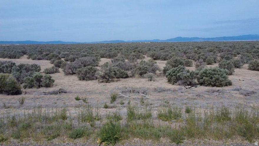 Rare opportunity to own 10 acres in Beryl, Utah with 0.5 acre-feet of valuable water rights included #71-4912 (1945). Right off of Beryl Highway with paved road access. Possible commercial applications. Perfect for building a home, cabin, barndominium, ranch property, mini farm, off-grid retreat, or recreational getaway. Plenty of space for livestock, horses, RVs, toys, gardens, orchards, or future development potential. Enjoy wide open spaces, privacy, dark night skies, and breathtaking desert and mountain views. Beryl is known for its peaceful rural lifestyle, outdoor recreation, ATV riding, hunting, camping, and easy access to Enterprise, Cedar City, and St. George. Water rights add tremendous long-term value in Southern Utah. Great investment, getaway, or future homestead opportunity.