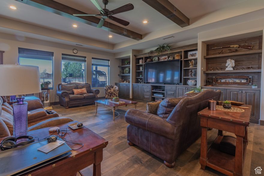 Equestrian dream on nearly 4 acres in the heart of red rock country! This spacious 4-bedroom, 4-bath single-level ranch-style home sits at the base of the Grand Staircase-Escalante and offers the perfect blend of comfort and adventure. Built with multi-generational living in mind, the home features three primary suites, two with private entrances, making it ideal for guests, in-laws, or rental potential. Inside, enjoy an expansive open-concept kitchen with granite countertops, double ovens, a built-in ice maker, and custom tile floors throughout. Outside, you'll find fully fenced horse pastures, six covered stalls with corrals, a tack shed, wash rack, and a large RV pad with 50-amp service. The oversized 3-car garage, ATV shed, and steel-fenced backyard add both function and security.