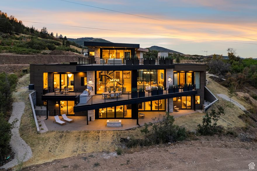 Step into a world where impeccable design meets the raw beauty of the Wasatch Mountains. This ski-in/ski-out estate in Marcella at Deer Valley East Village redefines alpine luxury, offering an unparalleled blend of sophistication, adventure, and exclusivity.  Over 3,600 sq. ft. of heated outdoor living space transforms this home into an entertainer's dream. Gather around the Wolf BBQ, pizza oven, and five stone-encased fire pits, as the warmth of the flames dances against the backdrop of breathtaking panoramic views. Whether hosting aprs-ski cocktails or unwinding under a canopy of stars, this space invites you to immerse yourself in mountain serenity.  Inside, radiant floor heating and floor-to-ceiling windows create a seamless connection to the outdoors. Hand-selected walnut and white oak cabinetry add timeless elegance, while thoughtfully curated design elements elevate every room into a sanctuary of comfort and style.  As an owner in Marcella at Deer Valley, you'll unlock privileges reserved for the elite. Membership in the Marcella Club grants exclusive access to a private ski lodge with concierge services and direct ski-in/ski-out access. Wellness enthusiasts will revel in the state-of-the-art fitness and yoga studio, indoor swimming pool, and rejuvenating spa amenities. For entertainment, enjoy a private golf simulator, an upscale arcade, and a lively aprs-ski scene.  For golf enthusiasts, the crown jewel of Marcella awaits-the Tiger Woods-designed championship golf course, an architectural feat sculpted into the breathtaking mountain landscape, offering a one-of-a-kind playing experience.  This home is more than a residence; it's a statement of prestige, an invitation to adventure, and a legacy to be cherished for generations.  Schedule your private tour today.