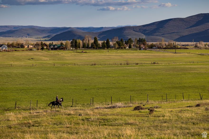 30 Beautiful Acres on the North Bench. Parcel has a moderately elevated corner which allows for spectacular views of the Uintah Mountains to the East and Mount Timpanogas to the Southwest. Perfect for an equestrian homesite, ranch, or family estate. Elevated bench overlooks alfalfa fields with impressive views in every direction. Minutes from the Weber River/ Canyon & the Uintah Mountains playground. Property is located 20 Minutes from Park City skiing, dining, and shopping, but maintains the rural feel of the Oakley/ Kamas Valley. Property comes with 71 shares of New Field & North Bench Irrigation Rights & has existing pressurized irrigation lines and a well system in place. The property could also be used to create smaller ranchette parcels. Property is North of the Oakley Cemetery on Big Piney Ranch Road. Listing Broker is related to Seller.