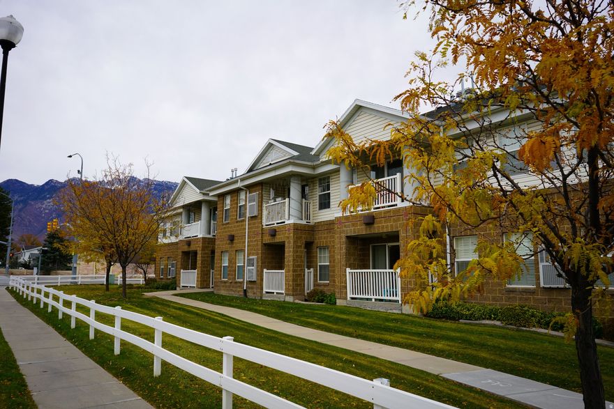 Discover the perfect blend of comfort and convenience in this beautiful condo at Crescent Heights, a 55+ community in Sandy. Designed for easy living, this main level unit offers effortless access with a dedicated parking space in the heated garage with a fenced storage space. The condo features a great room and kitchen with two bedrooms on either side. Residents enjoy a community center as well. See the extensive list of HOA CC&R's which make homeownership here essentially worry-free. Square footage figures are provided as a courtesy estimate only and were obtained from Salt Lake County Assessor Data. HOA CC&R's state the square footage is 1074. Buyer is advised to obtain an independent measurement.