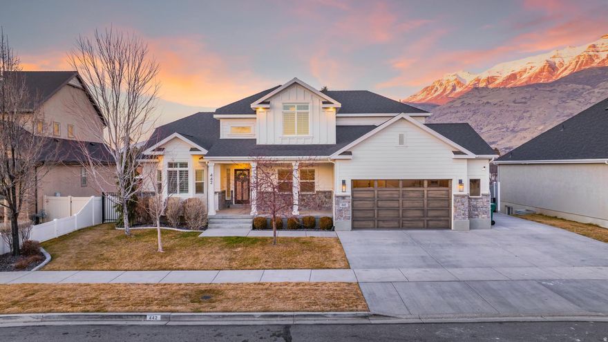 Welcome to this exceptional home nestled in a charming, mature North Orem neighborhood. Thoughtfully upgraded and meticulously maintained, this property showcases over $400,000 in high-quality improvements completed over the past several years. Every space has been carefully enhanced with intention, craftsmanship, and attention to detail, creating a truly turnkey dream home. From the moment you arrive, the pride of ownership is evident. The exterior has been professionally repainted and refreshed, featuring a new quiet-close garage door, upgraded front door and hardware, aluminum gates, and a white vinyl fence. The entire landscaping has been redesigned in both the front and backyard with river rock, mature trees, plants, custom curbing, and low-maintenance turf supported by an underlying sprinkler system. Outdoor living is elevated with a full wraparound TREX covered deck on both upper and lower levels, complete with electrical, soffit finishes, wrapped beams, and illuminated high-end railing caps along the deck and stairway. A built-in powered shed, outdoor TV hookups on both deck levels, and a concrete hot tub pad with pavilion and electrical hookup make this backyard an entertainer's dream. Inside, the home has been beautifully modernized throughout. Professionally installed LVP flooring, updated tile, new carpet installed February 2026, custom three-tone paint, upgraded doors and hardware, and refreshed lighting including sconces, chandeliers, and ceiling fans create a cohesive, designer feel. All bathrooms and kitchen fixtures, faucets, and sinks have been replaced and upgraded, along with new toilets throughout the home. The kitchen is a true centerpiece, featuring waterfall granite countertops, a granite sink with touchless faucet, refaced cabinetry with new hardware, a stunning floor-to-ceiling glass backsplash, and KitchenAid black stainless steel appliances. Built-in cabinetry and shelving have been added to the living room, and the fireplace mantle has been completely redesigned for a custom, elevated look. Built-in lockers enhance both the mudroom and laundry room for added functionality and organization. The primary suite offers a luxurious retreat with updated granite countertops and cabinetry, new tile flooring and walls, a euro-glass walk-in shower, and upgraded lighting. Upstairs bathrooms have been refreshed with new cabinetry, countertops, lighting, and glass. The fully remodeled walkout basement features updated LVP flooring, lighting, and doors, along with a finished bathroom and gym complete with mirrored walls. Additional upgrades include a recently replaced water heater and water softener under warranty, added electrical to the storage closet, and electrical enhancements for mounted TVs in bedrooms. The garage has been painted and includes electrical for a heater to give you year-round comfort.