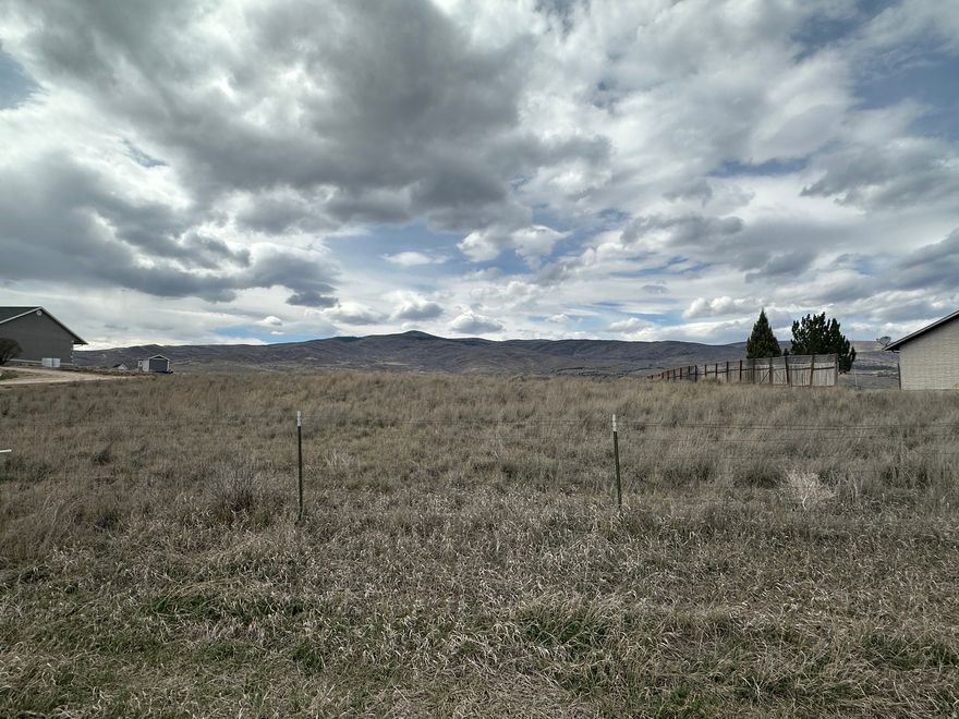 Large affordable building lot with 2 acres and 1 share of Indianola irrigation water included. Nice views of the mountains and valleys. Power and natural gas are available. Sewer would be a septic tank. Water would be a culinary well that would still need to be done by the buyer.