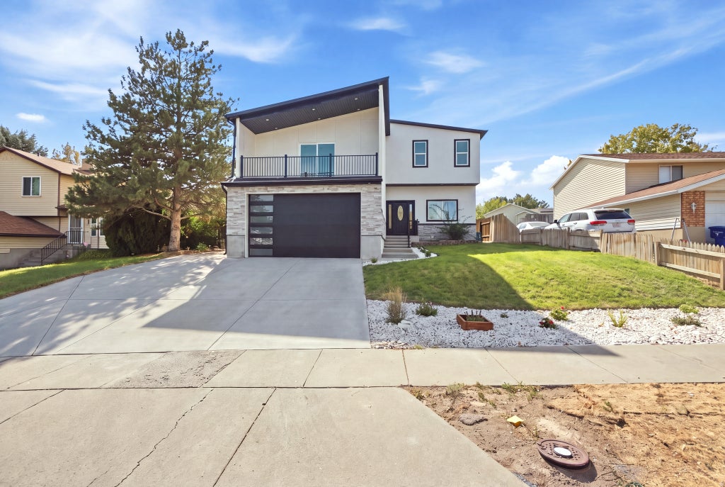 Photo of 6016 S LODER DR W, Kearns, UT 84118 (MLS # 2185933)