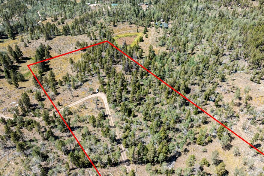 Manor Lands (year-round) gated community welcomes you.  Near Christmas Meadows and Bear River Lodge in the high Uinta Mountains. This raw 5 acre parcel has some of the best views and access up there.  Power is feet from the property.  Peppered aspen and pine trees, a pond and several build spots to choose from!