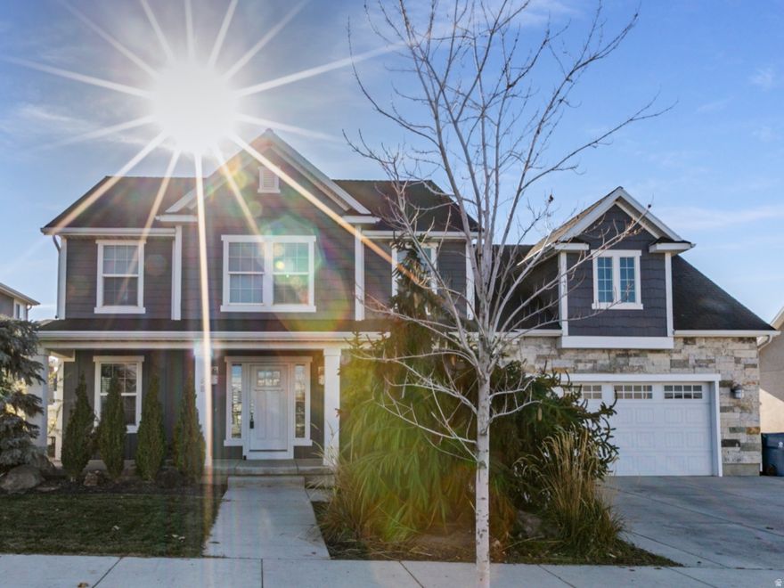 Finally, perfection has an address! This stunning and well-maintained home is ideally located close to schools, shopping, and walking/biking trails! You'll love the beautiful hardwood, quartz, lovely kitchen, and a perfectly sized yard with amazing mountain views and a large, covered patio, which will allow refreshing outdoor meals, parties, and fun! It's a large home with four bedrooms, and tons of additional room to expand in the basement. There's a great-sized detached garage to park a third car or to house a workshop, toys, or she shed! Beautiful homes in this neighborhood do not come along very often so don't wait!