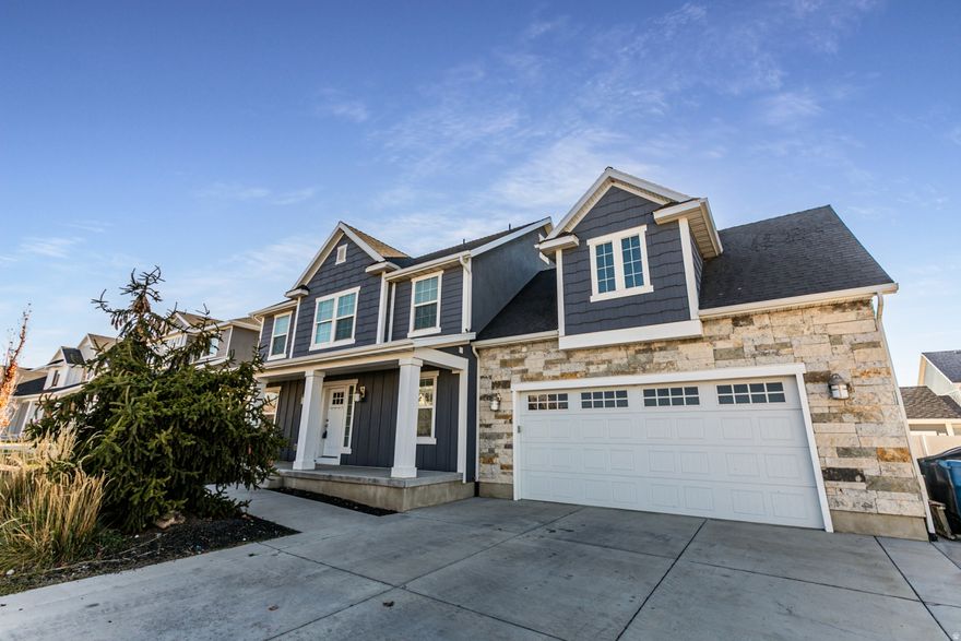 Finally, perfection has an address! This stunning and well-maintained home is ideally located close to schools, shopping, and walking/biking trails! You'll love the beautiful hardwood, quartz, lovely kitchen, and a perfectly sized yard with amazing mountain views and a large, covered patio, which will allow refreshing outdoor meals, parties, and fun! It's a large home with four bedrooms, and tons of additional room to expand in the basement. There's a great-sized detached garage to park a third car or to house a workshop, toys, or she shed! Beautiful homes in this neighborhood do not come along very often so don't wait!