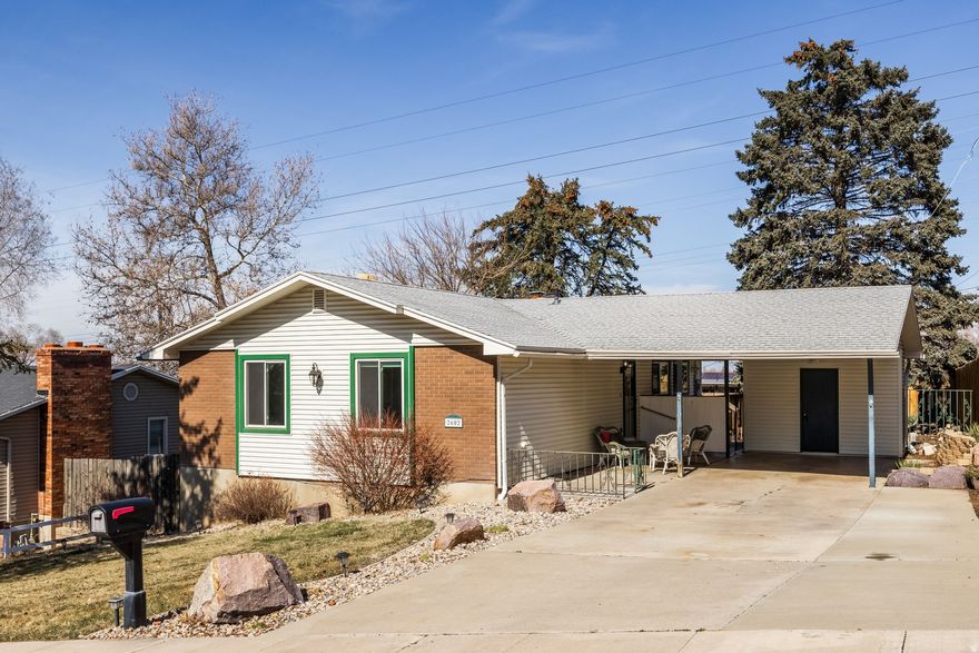 If you are seeking a well priced rambler, take a closer look at this spacious 4 bedroom home featuring a large fenced backyard in a convenient location close to schools, Hill Air force Base, Ogden airport and commuter routes. The interior features 2 large family gathering areas each with a fireplace and an additional dining or den area to meet your specific needs. Recently updated, the eat in kitchen with granite counters, stainless appliances and loads of storage space, hosts sliding glass doors that lead to an entertainment sized deck and large patio area where  you are sure to enjoy summer bbq's and sunset skies. A tankless hot water system and updated vinyl windows throughout offer energy efficiency. Each of the bedrooms have generous closets, while a large laundry room, spacious storage room and multiple exterior sheds will satisfy your storage needs.