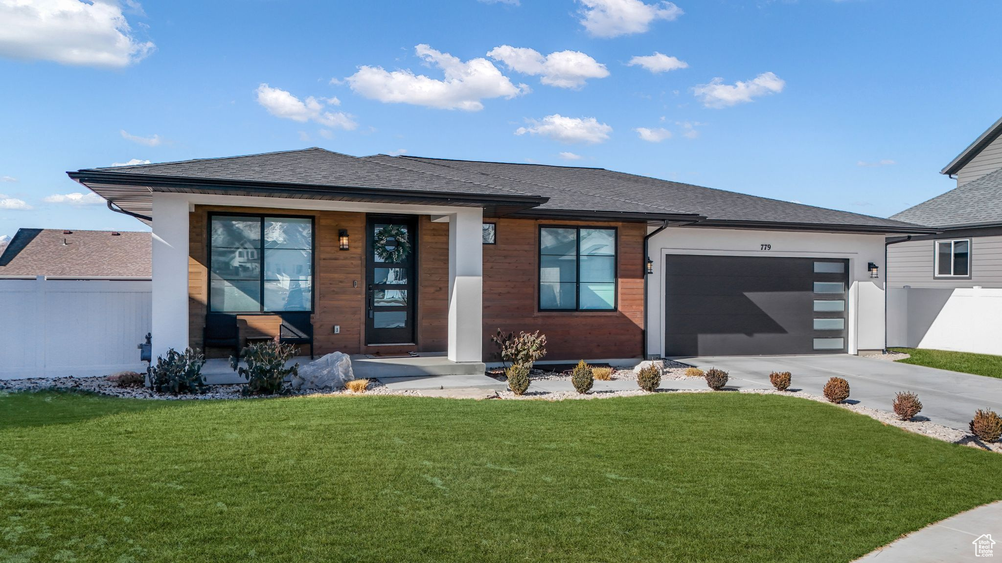 This beautiful home is located in one of Tooele's most sought-after neighborhoods, England Acres. This modern prairie rambler built in 2022 boasts 5 finished bedrooms, 2 large living rooms, an oversized 2-car garage, and a beautiful open floor plan. On the main level, you will find extra tall ceilings and doors, adding to the feel of luxury. The basement has 8' ceilings that give a rare open feeling for a basement. The fully landscaped yard comes with a large concrete pad perfect for nights around the fire or relaxing under the sun. The large storage room is ready to be converted to a 6th bedroom, perfect for a growing family.   If you are looking for affordable luxury, in the perfect neighborhood, do not miss out on this one! Schedule your tour today! ***Assumable FHA Loan****