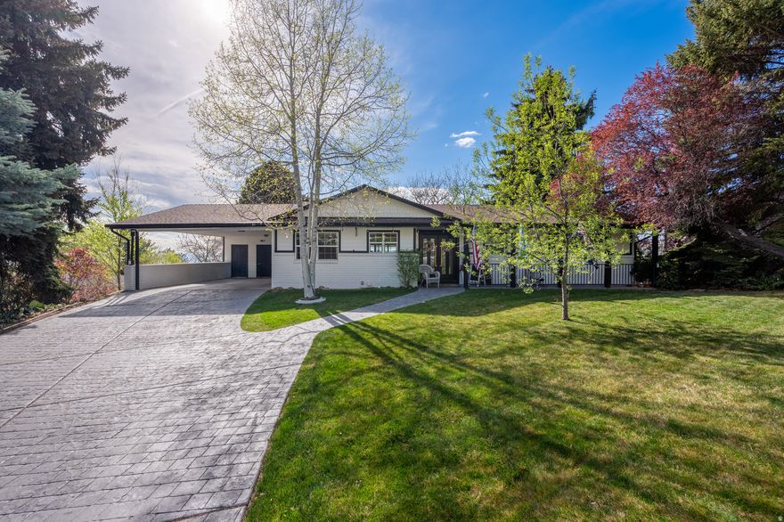 Beautifully updated home in a prime Provo location with breathtaking, unobstructed views of the valley and Utah Lake. Large windows span the entire west wall in both the main level and basement family rooms, filling the home with natural light and showcasing the incredible scenery.  The home features granite countertops, LVP and tile flooring throughout, and thoughtful updates that create a clean, modern feel. The spacious layout offers comfortable living on both levels, perfect for relaxing or entertaining.  Step outside to a large deck just off the main family room, ideal for enjoying sunsets and the surrounding views. The backyard includes an above ground pool, providing a great space for summer fun and gatherings.  This is a rare opportunity to own a move in ready home with some of the most spectacular views in the area.