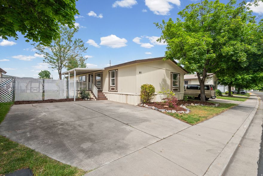 Beautifully updated  mobile home located in a quiet, clean, and well-kept community. This spacious 4 bedroom, 2 bathroom home offers approximately 1,836 sq ft with a functional open layout, large living area, dining space, and dedicated laundry room. Several bedrooms feature walk-in closets for added storage and convenience. Recent upgrades include new flooring, fresh paint, refinished cabinets, updated countertops, modern fixtures, new hardware throughout, newer windows, newer roof, and new patio decking. Fully fenced yard with room to relax, entertain, or play. Move-in ready with possible seller financing available!