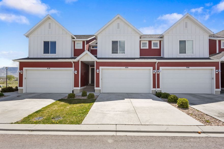 Ready to have Willow Park right in your backyard? With no rear neighbors, this townhome offers incredible, unobstructed views of the Wasatch Mountains, along with direct access to walking trails, nature, and a peaceful river setting-truly one of a kind. Step into a bright, open layout featuring modern finishes throughout and a like-new feel. The home boasts a spacious primary suite with dual walk-in closets, brand-new blinds throughout, and room to grow with an unfinished basement ready for your personal touch. Enjoy the convenience of a fully integrated smart security system, allowing you to control lighting, door locks, garage access, and more-all at your fingertips. Take in the serene scenery from your backyard, perfect for relaxing or entertaining, and enjoy access to the community pool and all the amenities the HOA has to offer. Come see it today!