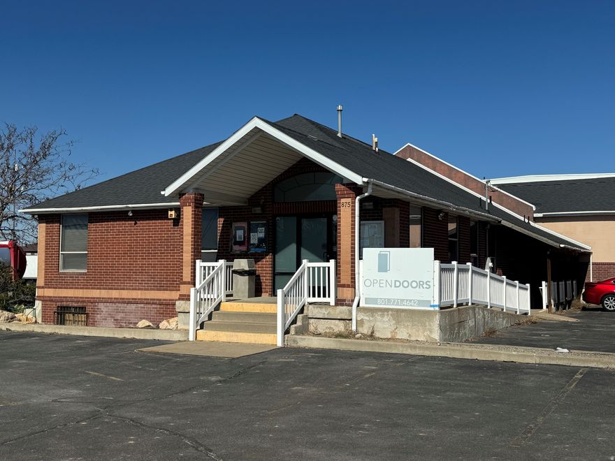 This 14,700 square foot building is located on the lit intersection of Fairfield Road and Highway 193 in Layton, Utah. It has been the long-time home to Open Doors and the local food bank. The building has a warehouse of approximately 10,000 square feet and office of approximately 4,800 square feet. This is an amazing opportunity for a visible headquarters office with warehouse in a retail location.