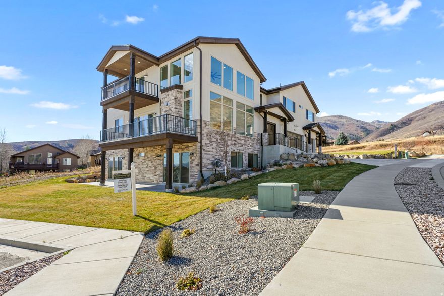 This newly built custom single family home in the peaceful Sunburst Ranch neighborhood, with unobstructed mountain and valley views! Your new home in Sunburst Ranch is on the western bench of Midway. It is the perfect combination between luxury living and the rural lifestyle many have only dreamed of. There are mountain views from every level of the home with two large covered balconies and a lower level covered patio. Features also include vaulted living room ceilings, an open floor plan, and large windows that bring in natural light and mountain views. The luxury kitchen includes soft close cabinets and drawers, gas stove, and quartz countertops. Downstairs features a large theater room, walkouts from two of the 3 bedrooms, a large family room, and a wet bar. Hymark Homes' construction and finishes are premium in the building business. You can be assured a premium built product with a 1 -year builders home warranty to call your home. Sunburst Ranch provides a beautiful balance between a secluded and quiet home yet close to Midway's famous crater, shops, lodges and restaurants as well as all that Park City has to offer just 30 miles away. Square footage figures are provided as a courtesy estimate only and were obtained from the building plans. Buyer is advised to obtain an independent measurement. The landscaping is included in the price of the home and will be installed by the builder according to the HOA standards.
