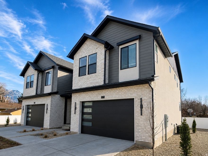 New construction in Trailside Reserve! This stylish twin home lives like a single-family home with a fireplace insert, quartz countertops, under-cabinet lighting, included blinds, and an open great room. EV charging port installed, fully fenced backyard, full unfinished basement, and low-maintenance HOA living. Virtually staged; photos may vary by unit. The photographs depict a different model with the same finishes and are provided for illustrative purposes only.