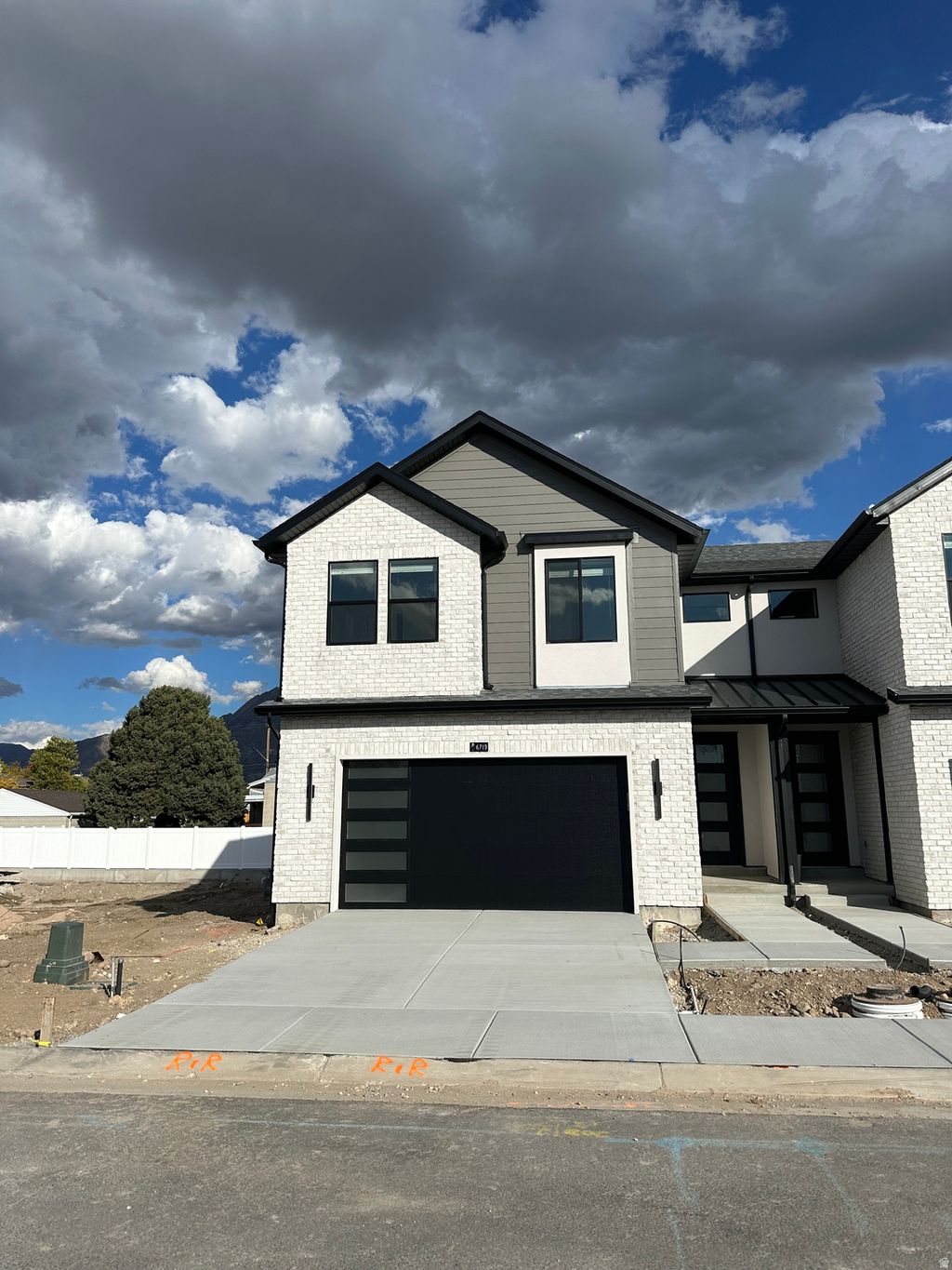 Photo of 6711 S VAUGHN LN E #7, Midvale, UT 84047 (MLS # 2145065)